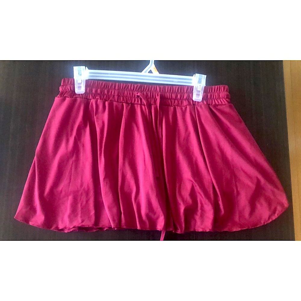 3 Flowy skorts, pink, navy, and Black